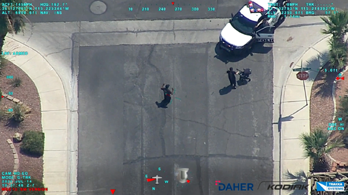 This image from the Kodiak 900 MMA’s underwing-mounted sensor turret shows two suspects surrendering to police after the agency benefited from the aircraft’s persistent surveillance capabilities – even when the agency’s own helicopter had to depart the scene for refueling.