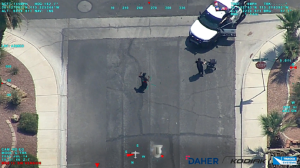 This image from the Kodiak 900 MMA’s underwing-mounted sensor turret shows two suspects surrendering to police after the agency benefited from the aircraft’s persistent surveillance capabilities – even when the agency’s own helicopter had to depart the scene for refueling.