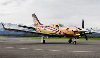 The TBM 980 for Dr. Ian Fries is shown at Daher Aircraft’s Tarbes, France headquarters prior to its ferry flight to the United States. Visible on the nose is the distinctive carnation motif that honors Dr. Fries’ relationship with his patients.
